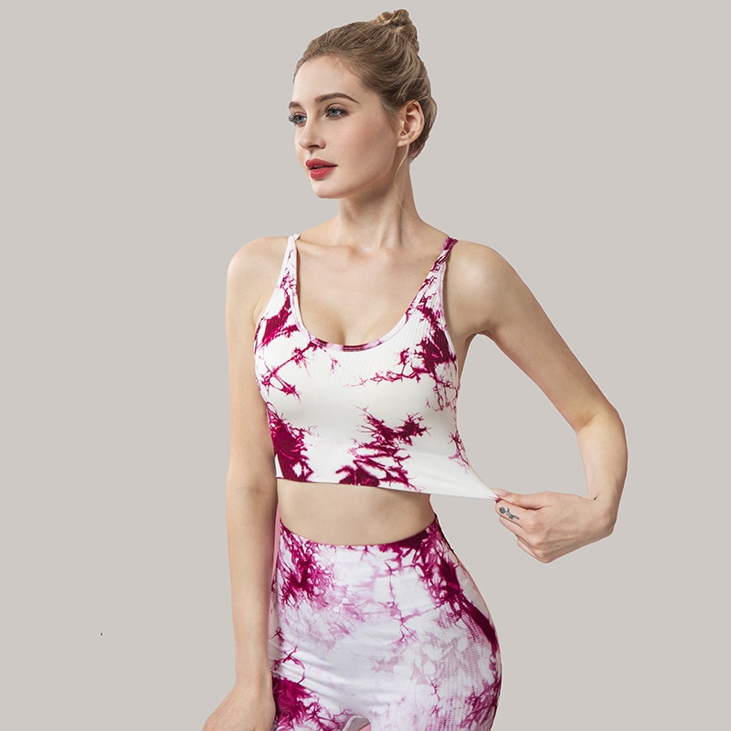 Women's printed sports bra in tie-dye pattern, ideal for yoga. Breathable nylon activewear for ladies. Stylish and comfortable fit.